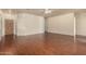 Bright living room with hardwood floors and an open layout, perfect for entertaining at 16848 W Rimrock St, Surprise, AZ 85388