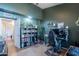 Charming bedroom featuring a functional workspace, complemented by a built-in bookcase for organized storage at 1718 S Longmore -- # 95, Mesa, AZ 85202