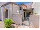 Stylish townhouse with a private gated entrance, desert landscaping, and a cozy front patio at 1718 S Longmore -- # 95, Mesa, AZ 85202