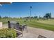 The Golf course in the Ranch Community. View of the Tee boxes and fairway from a shaded sitting area at 1718 S Longmore -- # 95, Mesa, AZ 85202