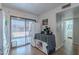 Kitchen view showcasing sliding glass doors, stainless refrigerator, and backyard patio access at 1718 S Longmore -- # 95, Mesa, AZ 85202
