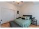 Relaxing main bedroom with a comfortable bed and serene décor, enhanced by a spacious closet at 1718 S Longmore -- # 95, Mesa, AZ 85202