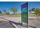 Informational park sign with details on rules, regulations, and amenities for visitors at 1718 S Longmore -- # 95, Mesa, AZ 85202