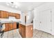 Well-designed kitchen featuring granite countertops, a central island, and easy access to the living space at 1718 W Colter St # 195, Phoenix, AZ 85015