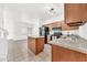 A fully equipped kitchen with granite countertops, island, and modern appliances, ready for your culinary creations at 1718 W Colter St # 195, Phoenix, AZ 85015