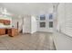 Spacious open-concept living area with lots of light, ceramic tile, and kitchen area nearby at 1718 W Colter St # 195, Phoenix, AZ 85015