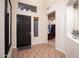 The beautiful home foyer features tile flooring and a view into the office area at 2038 W Whisper Rock Trl, Phoenix, AZ 85085