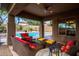 Relaxing outdoor living space, featuring a covered patio and view of the sparkling pool at 2038 W Whisper Rock Trl, Phoenix, AZ 85085