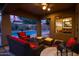Inviting outdoor living area with comfortable seating and pool view at 2038 W Whisper Rock Trl, Phoenix, AZ 85085