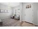 Bright entryway featuring a chandelier, neutral decor, and a welcoming atmosphere at 22728 E Camacho Rd, Queen Creek, AZ 85142