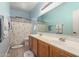 This bathroom features double sinks with blue walls and a shower with a dragonfly curtain at 2721 E Schiliro Cir, Phoenix, AZ 85032