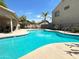 This community pool is surrounded by lush landscaping and has plenty of seating at 2721 E Schiliro Cir, Phoenix, AZ 85032