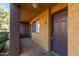 Exterior of condo showing door and window with a peek of a walkway and nearby car at 3601 W Tierra Buena Ln # 168, Phoenix, AZ 85053