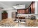 Kitchen with granite countertops, stainless steel appliances and tile floors at 3601 W Tierra Buena Ln # 168, Phoenix, AZ 85053