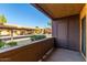 Charming outdoor patio with views of carport and landscaped greenery, providing a serene setting at 3601 W Tierra Buena Ln # 168, Phoenix, AZ 85053