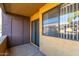 Cozy patio space with sliding glass door and textured walls, perfect for enjoying the outdoors at 3601 W Tierra Buena Ln # 168, Phoenix, AZ 85053