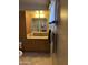 Well-lit bathroom featuring ample counter space, storage cabinets, and an updated vanity at 3749 E Laurel Ln, Phoenix, AZ 85028