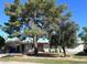 Charming single story home with mature trees and lush, green lawn at 3749 E Laurel Ln, Phoenix, AZ 85028