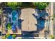 Aerial view of the property showcases the backyard pool, lush landscaping, and expansive lot at 3901 E Packard Dr, Gilbert, AZ 85298