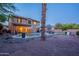 Outdoor oasis with a refreshing pool, landscaped yard, and comfortable seating areas for relaxing at 3901 E Packard Dr, Gilbert, AZ 85298