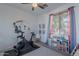 Bedroom featuring exercise equipment and a colorful decor at 3901 E Packard Dr, Gilbert, AZ 85298