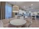 Bright and spacious kitchen with an adjacent breakfast nook and view to the open living space at 3901 E Packard Dr, Gilbert, AZ 85298