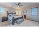 Serene primary bedroom retreat with a king-size bed, plush rug, and calming color scheme at 3901 E Packard Dr, Gilbert, AZ 85298