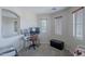 Office space with natural light and simple furnishings at 3901 E Packard Dr, Gilbert, AZ 85298