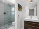 Contemporary bathroom features a mosaic-tiled shower and sleek vanity with modern fixtures at 4218 E Palo Verde Dr, Phoenix, AZ 85018