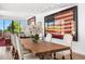 Refined dining area featuring a wooden table, upholstered chairs, and curated wall art at 4218 E Palo Verde Dr, Phoenix, AZ 85018
