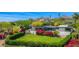 Stunning exterior view of a modern home, showcasing lush landscaping, a pool, and mountain views at 4218 E Palo Verde Dr, Phoenix, AZ 85018