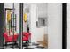 Elegant foyer with black and white marble flooring, red accents and a view of a bright, modern interior at 4218 E Palo Verde Dr, Phoenix, AZ 85018