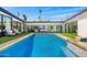 Beautiful pool area with modern outdoor furniture, perfect for relaxing and entertaining at 4218 E Palo Verde Dr, Phoenix, AZ 85018