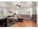 Finished bonus room features natural light, soft neutral paint, and ample seating at 42711 N 45Th Dr, Phoenix, AZ 85087