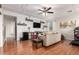 Large bonus room features laminate floors, modern decor, and a flat-screen TV at 42711 N 45Th Dr, Phoenix, AZ 85087