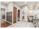 Upstairs hallway featuring wood flooring and access to bathroom and bedroom at 42711 N 45Th Dr, Phoenix, AZ 85087