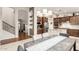 Open kitchen with an island, stainless steel appliances, and wood cabinets at 42711 N 45Th Dr, Phoenix, AZ 85087
