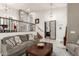 Cozy living room with a staircase and black metal door for extra design at 42711 N 45Th Dr, Phoenix, AZ 85087