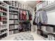 This closet is fully stocked with shelves and storage for shoes, clothes, and other items at 42711 N 45Th Dr, Phoenix, AZ 85087