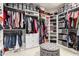 This closet is fully stocked with shelves and storage for shoes, clothes, and other items at 42711 N 45Th Dr, Phoenix, AZ 85087