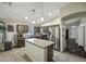Well-equipped kitchen featuring stainless steel appliances, a center island, and ample cabinet space for storage at 42760 W Magnolia Rd, Maricopa, AZ 85138