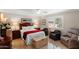 Bright bedroom with a large window, tile floors, and comfortable seating area at 4306 E Dragoon Cir, Mesa, AZ 85206