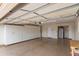 This spacious garage features built in cabinets and storage, an extra fridge and workspace at 4306 E Dragoon Cir, Mesa, AZ 85206