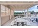 Covered outdoor grilling area featuring picnic tables and built-in grills, great for community gatherings and barbecues at 4306 E Dragoon Cir, Mesa, AZ 85206
