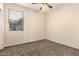 Bedroom featuring carpet and a window allowing in natural light at 4335 E Sleighbell Dr, Gilbert, AZ 85297