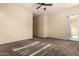 Bedroom featuring neutral walls, carpet, and a door to the outside at 4335 E Sleighbell Dr, Gilbert, AZ 85297