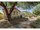 A well-maintained single-Gathering home featuring desert landscaping, a two-car garage, and a cozy neighborhood ambiance at 4335 E Sleighbell Dr, Gilbert, AZ 85297