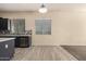 Open concept kitchen and living room featuring an island, stainless appliances, and tile floors at 4335 E Sleighbell Dr, Gilbert, AZ 85297