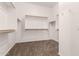 Spacious walk-in closet with built-in shelving and ample storage space at 4335 E Sleighbell Dr, Gilbert, AZ 85297