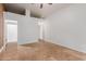 Spacious bedroom with tile flooring and a door leading to a bathroom or closet at 4401 E Hubbell St # 57, Phoenix, AZ 85008